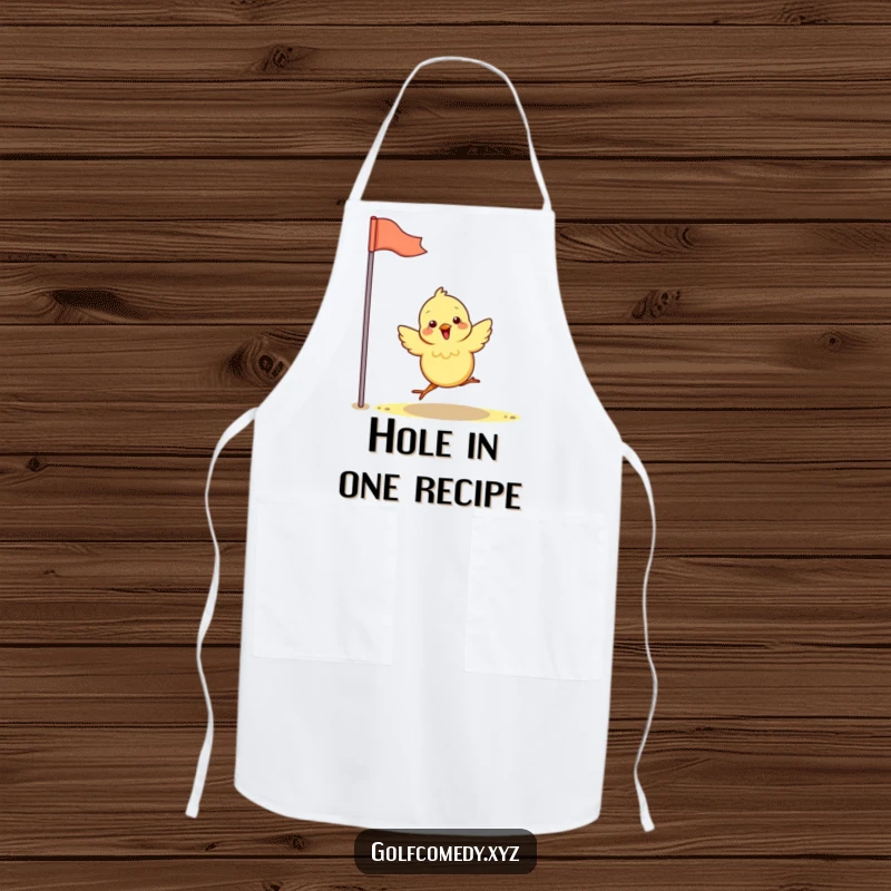 Funny chick happily hops towards a golf flag, featured on a durable apron, ideal for humorous chefs and golfers.